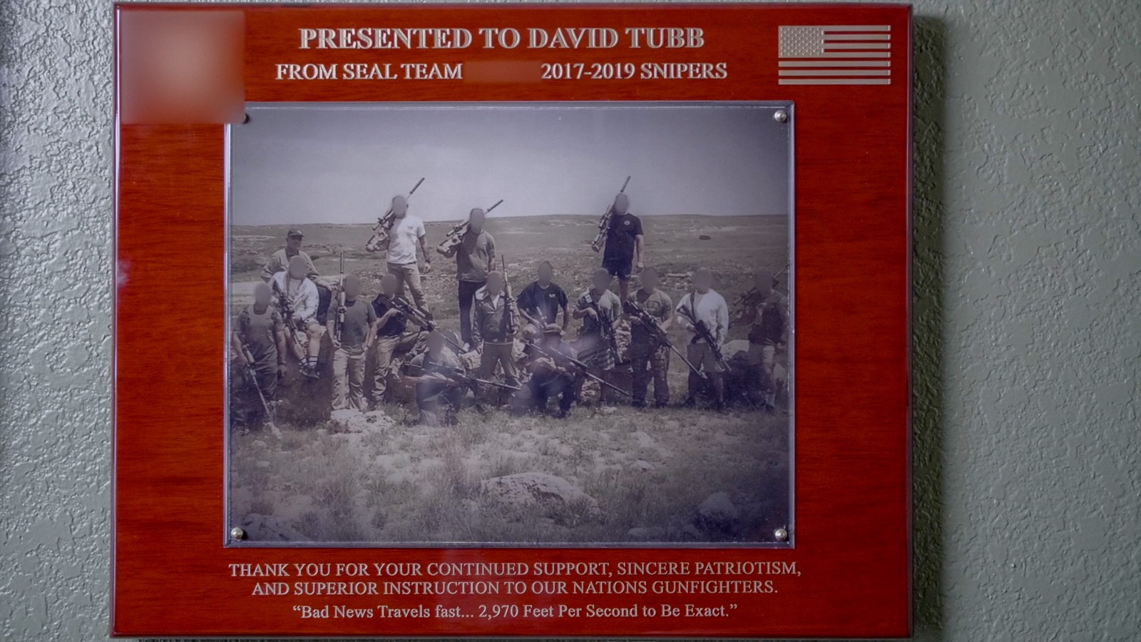 A plaque presented to David Tubb by a Navy SEAL Team sniper course